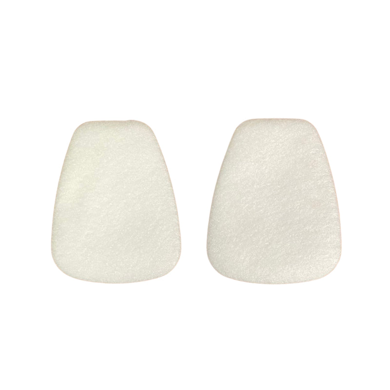 Two white respirator filters on a white background
