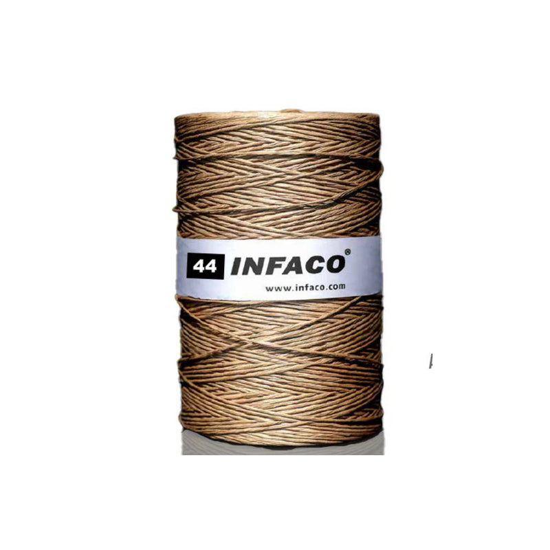 Spool of brown thread with Infaco label on a white background