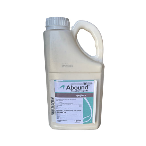 a white jug with a blue, red and black label against a white background