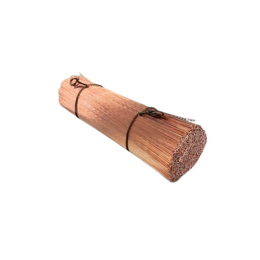 Copper wire tied together on a white background