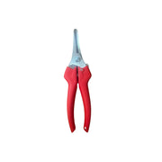 Red-handled harvesting snips on a white background