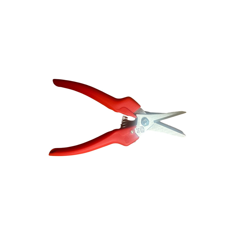Red-handled snips on a white background