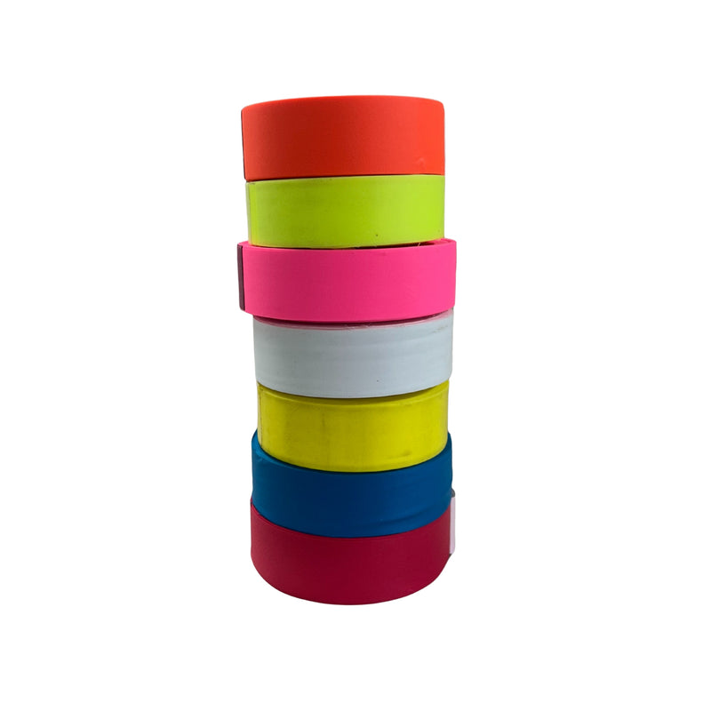 Stack of colorful resistance bands on a white background