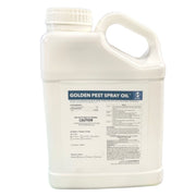 Small jug of Golden Pest Spray Oil on a white background