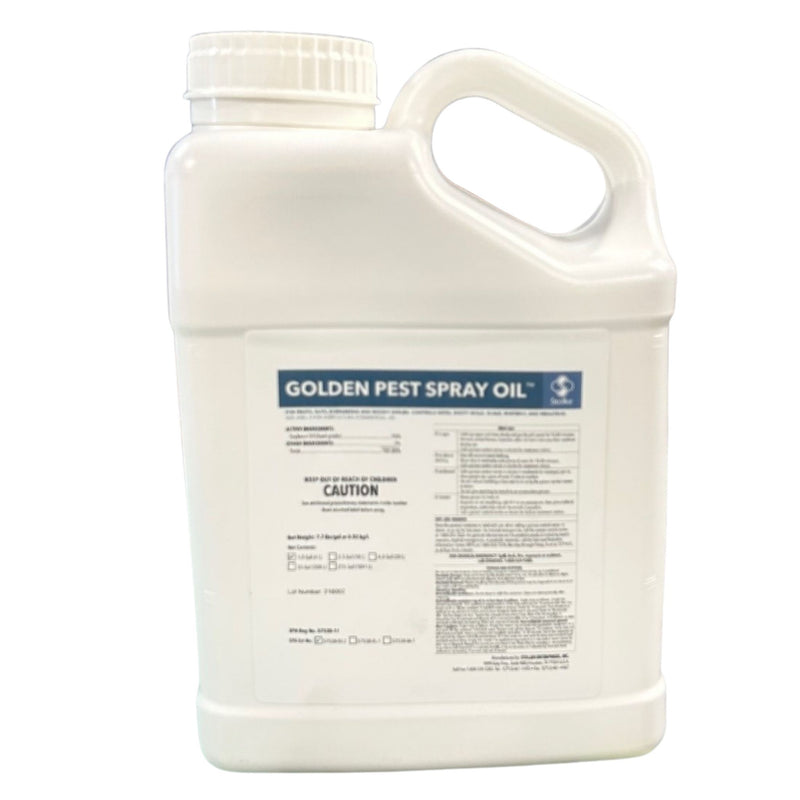 Small jug of Golden Pest Spray Oil on a white background