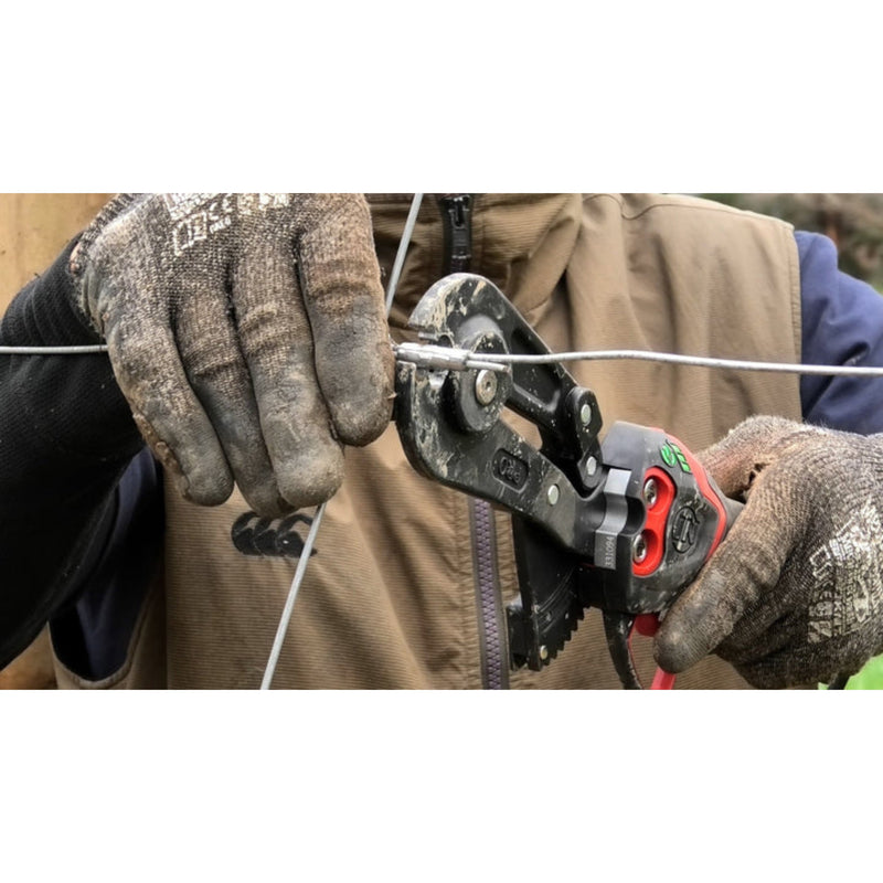 Person using a wire crimping tool with gloves on a white background