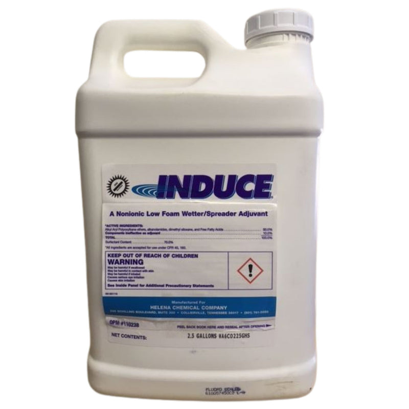 A white jug with a blue and white label on a white background