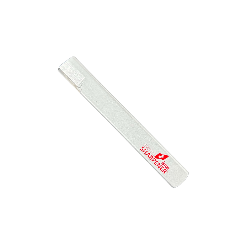 Silver sharpener with red lettering against a white background 