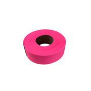 Pink roll of tape on a white background