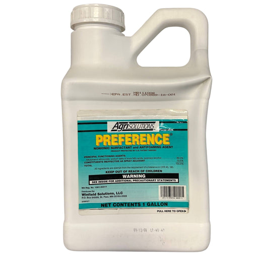 White jug with a teal and white label on a white background