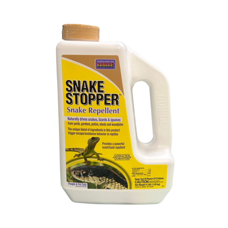 A white bottle with a yellow Snake Stopper Snake Repellent label against a white background